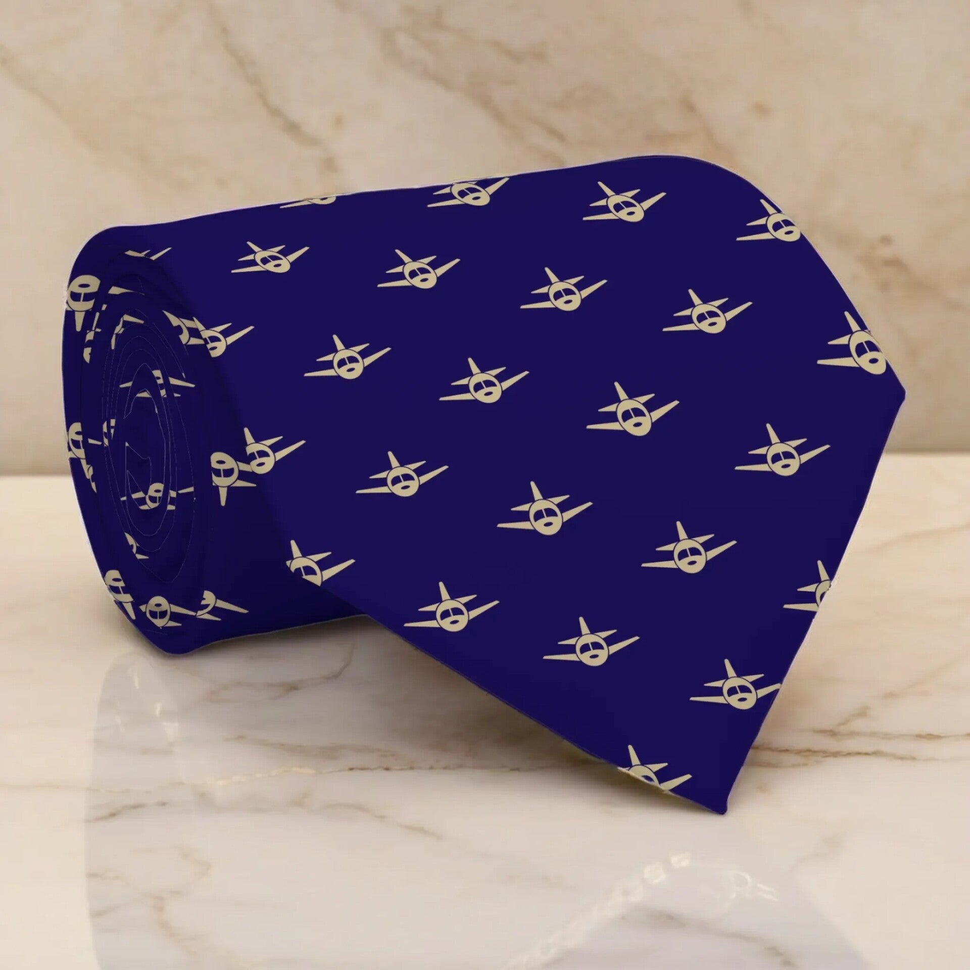 Example of customizable necktie with uploaded Gold airliner icon to create a pattern on a blue background
