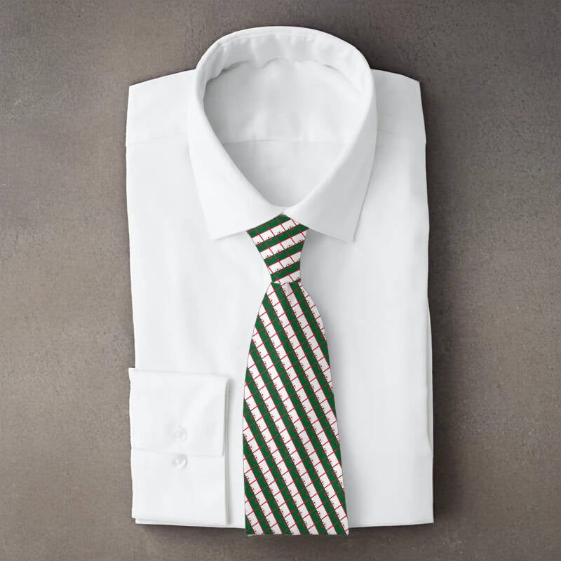 Algeria flag necktie on folded white shirt
