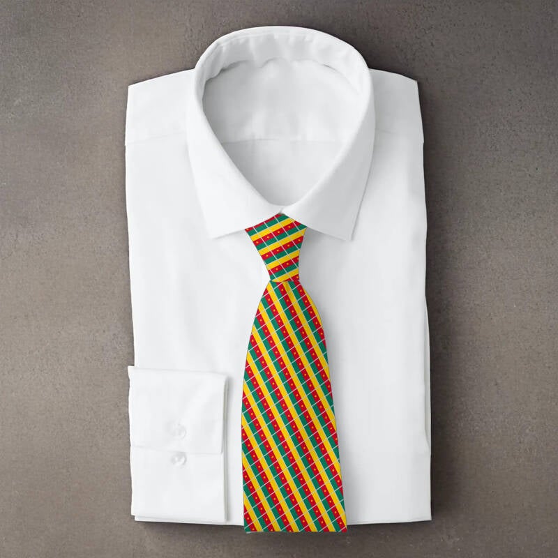 Cameroon flag necktie on folded white shirt