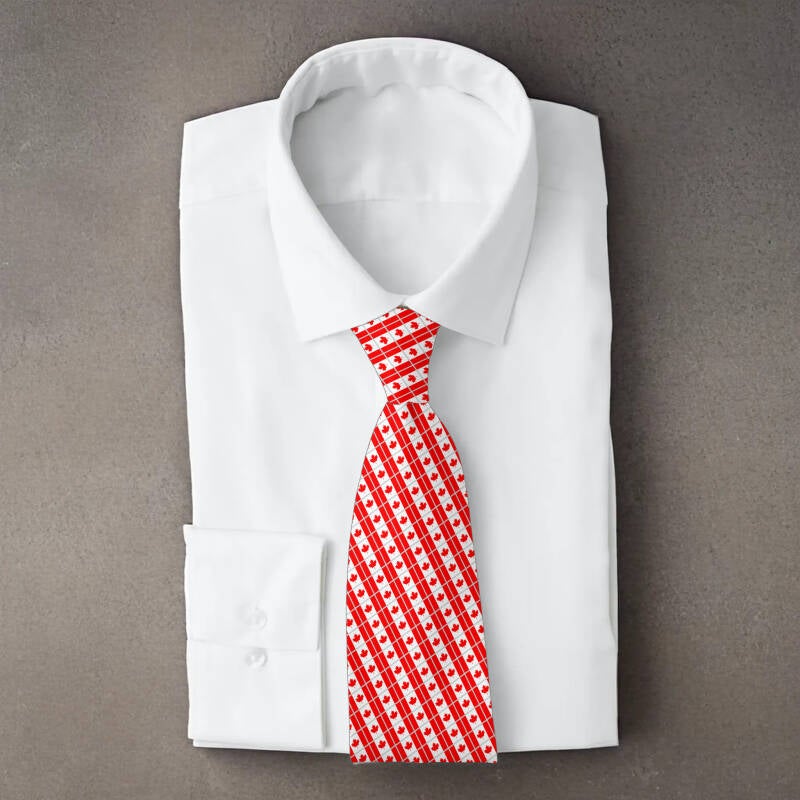 Canada flag necktie on folded white shirt