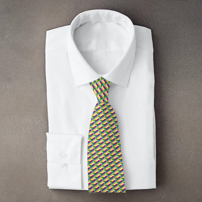 Comoros flag necktie on folded white shirt