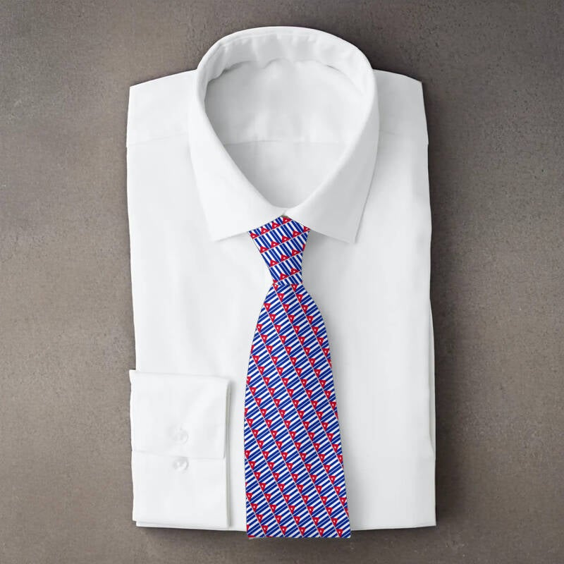 Cuba flag necktie on folded white shirt