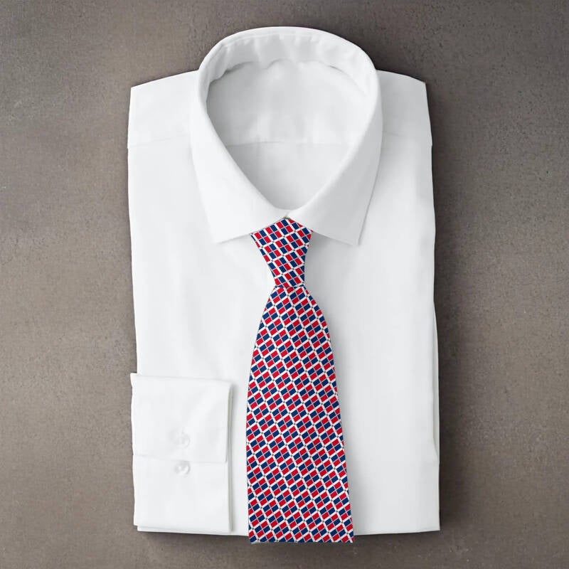 Dominican Republic flag necktie on folded white shirt