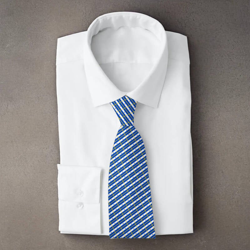 El Salvador flag necktie on folded white shirt