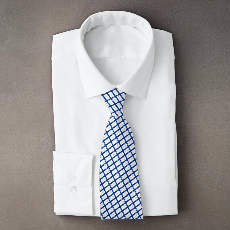 Finland flag necktie on folded white shirt