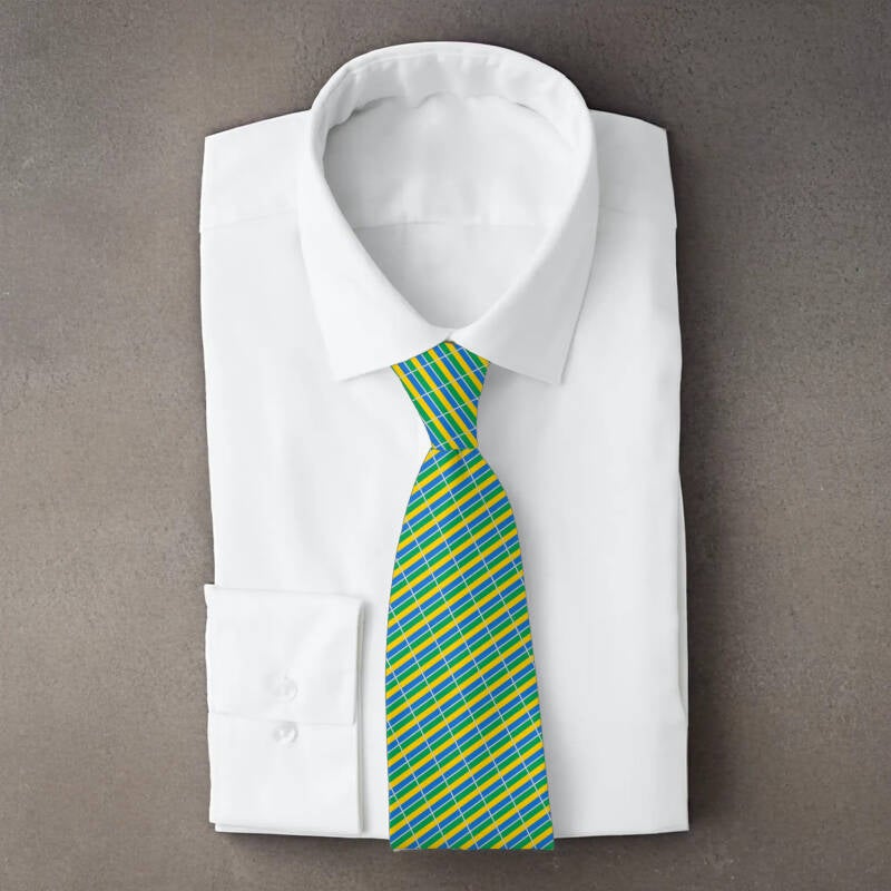 Gabon flag necktie on folded white shirt