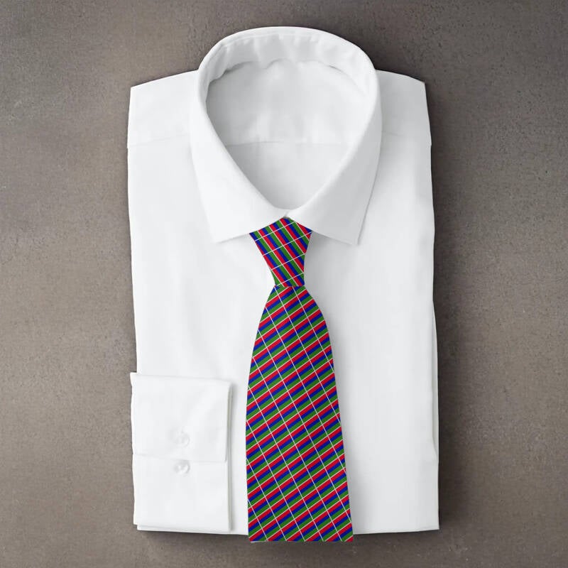 Gambia flag necktie on folded white shirt