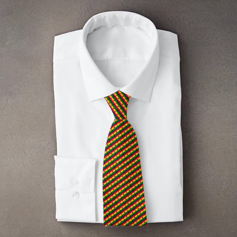 Ghana flag necktie on folded white shirt