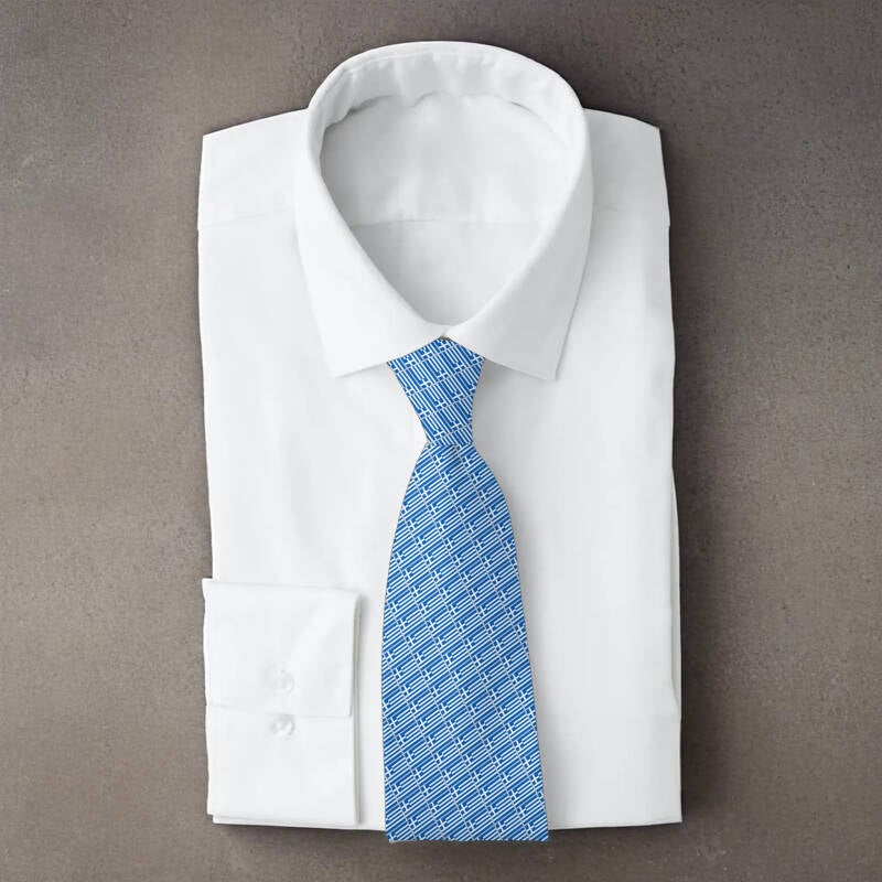 Greece flag necktie on folded white shirt