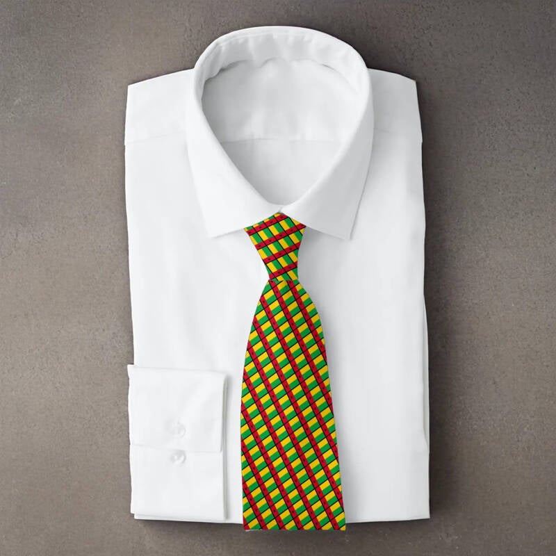 Guinea-Bissau flag necktie on folded white shirt