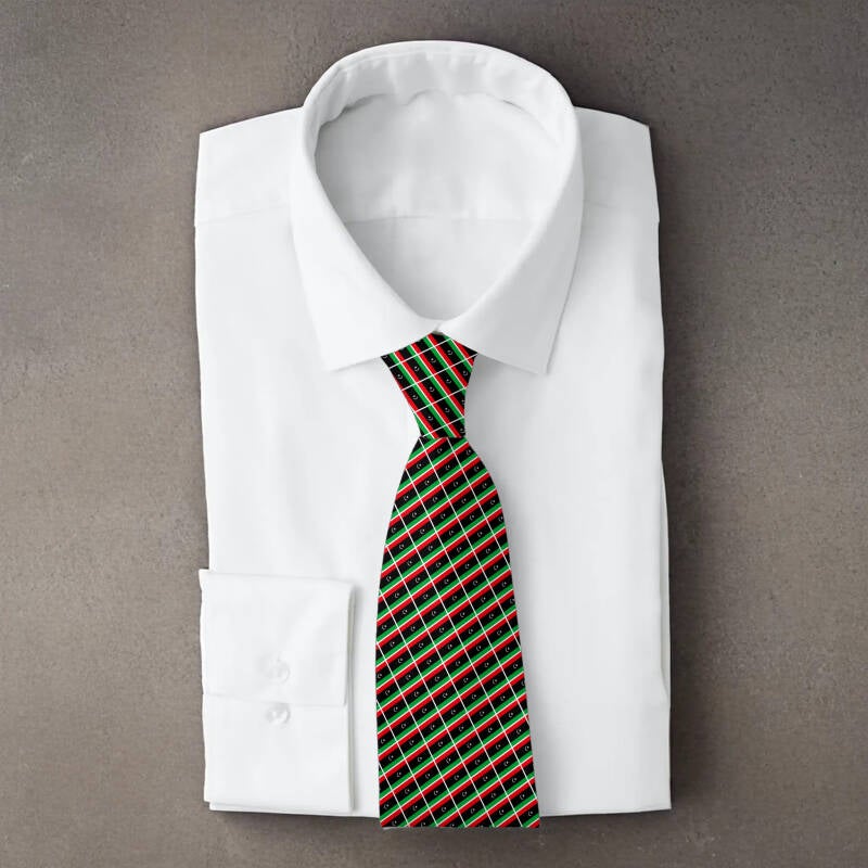 Libya flag necktie on folded white shirt