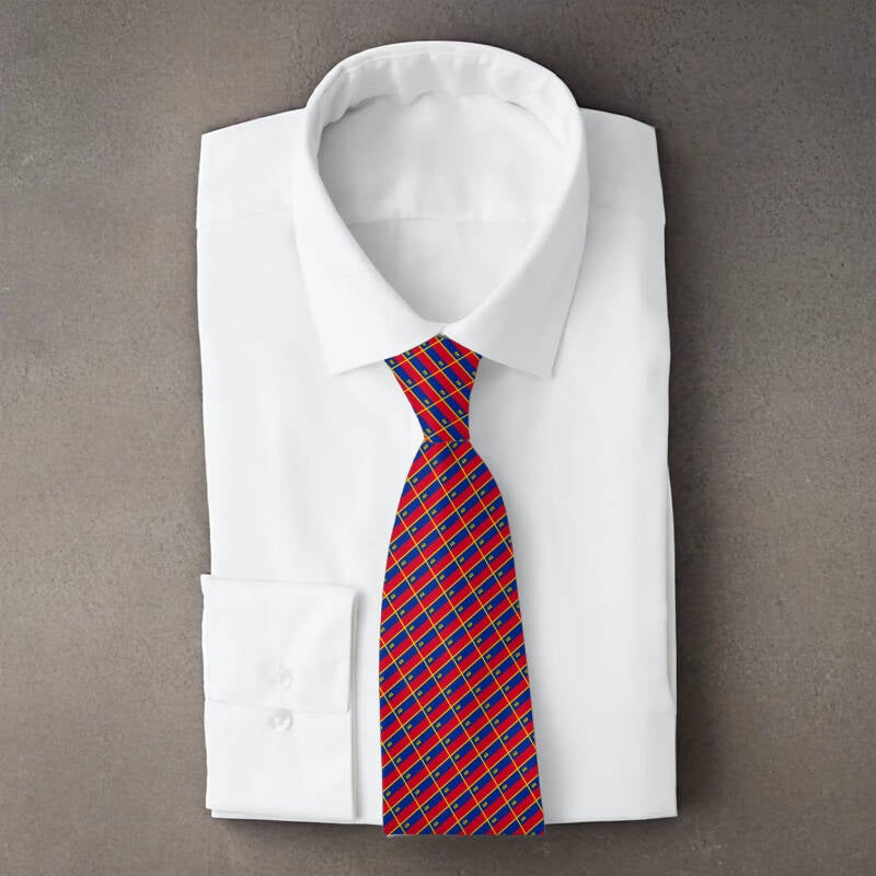 Libya flag necktie on folded white shirt