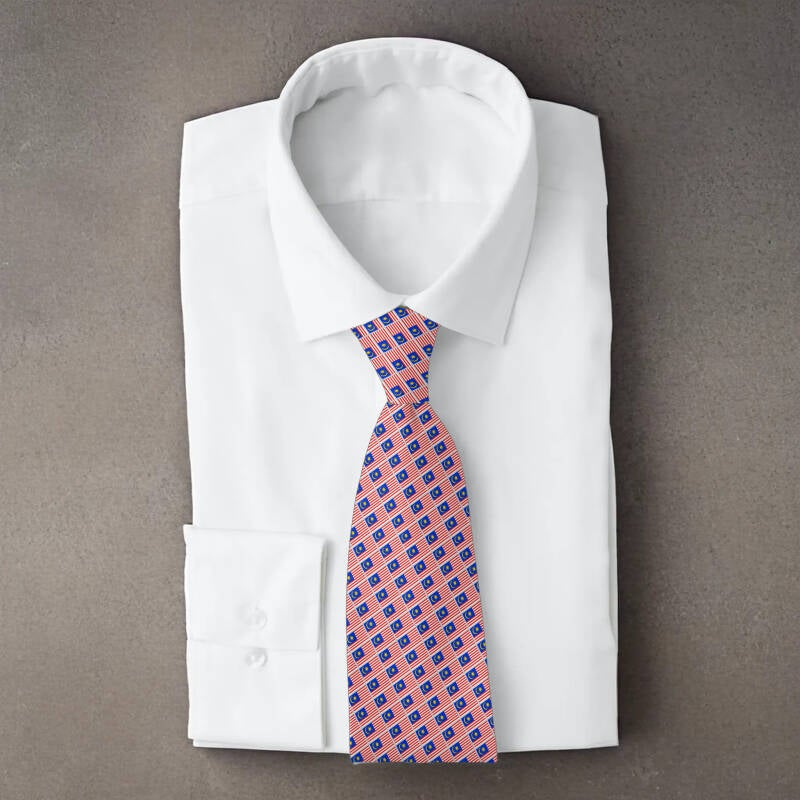 Malaysia flag necktie on folded white shirt