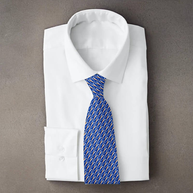 With its sweeping design and radiant star, this tie is both striking and symbolic, fitting for formal occasions, heritage pride, or casual outings.