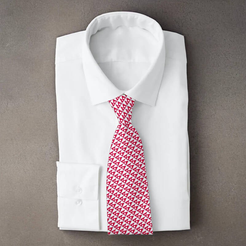 Nepal flag necktie on folded white shirt