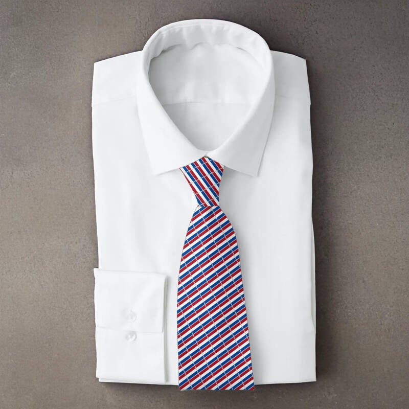 Netherlands flag necktie on folded white shirt