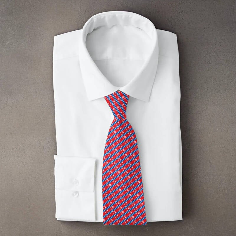 North Korea flag necktie on folded white shirt