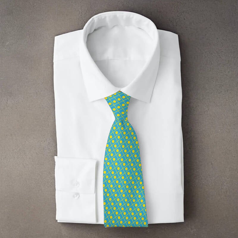 Palau flag necktie on folded white shirt