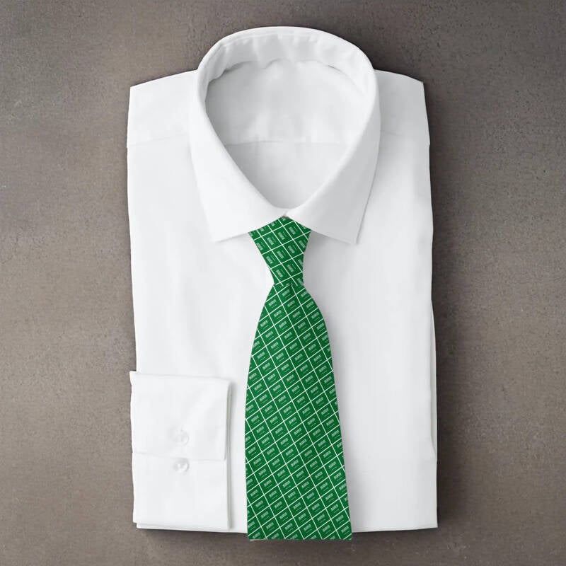 Saudi Arabia flag necktie on folded white shirt