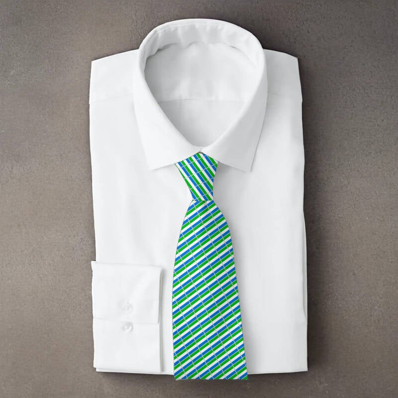 Sierra Leone flag necktie on folded white shirt