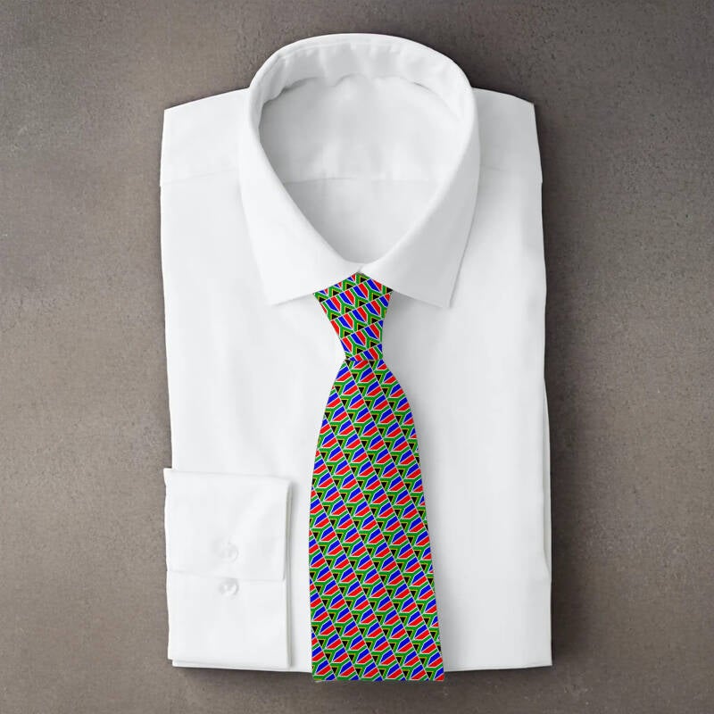 South Africa flag necktie on folded white shirt