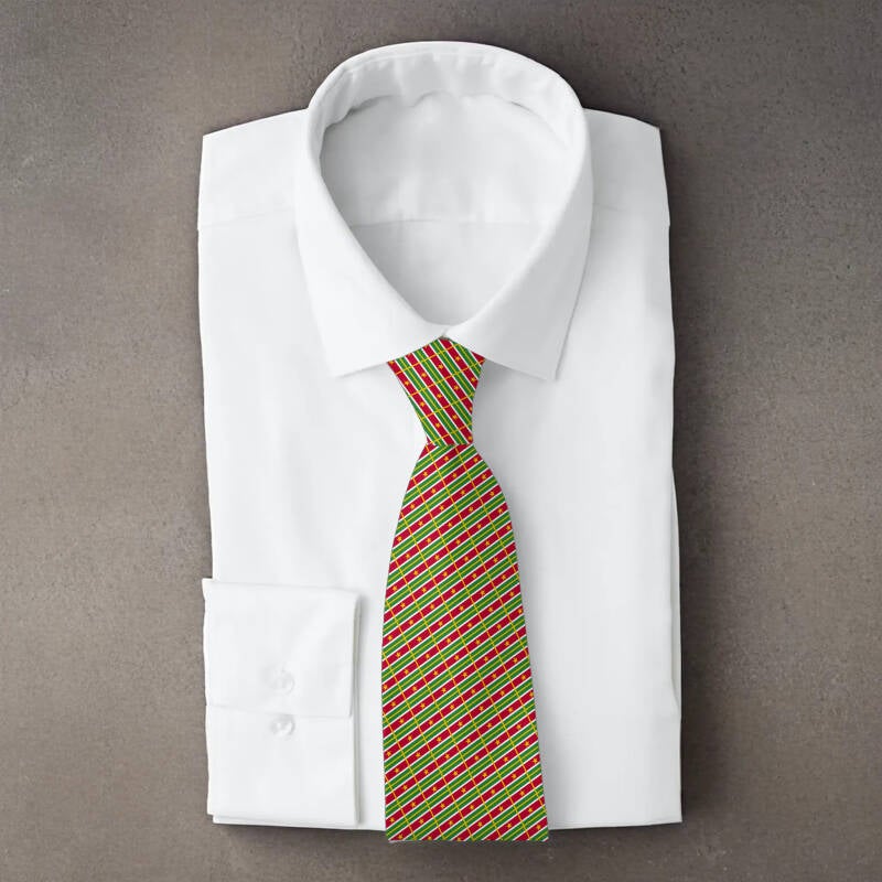 Suriname flag necktie on folded white shirt