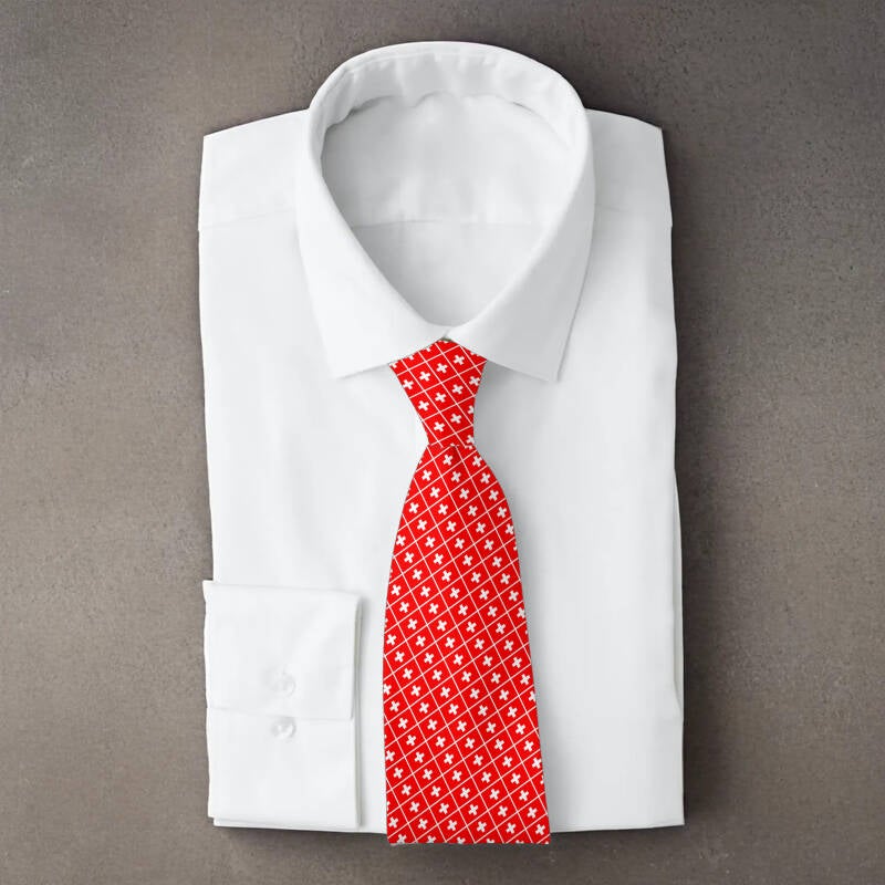Switzerland flag necktie on folded white shirt