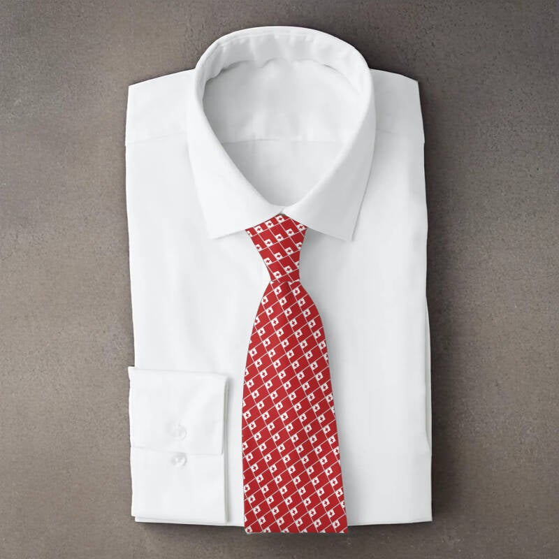 Tonga flag necktie on folded white shirt