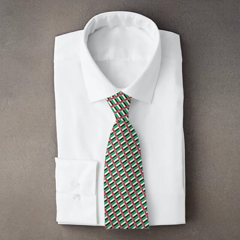 United Arab Emirates flag necktie on folded white shirt