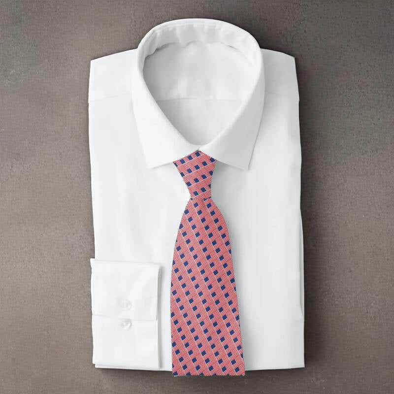 United States flag necktie on folded white shirt