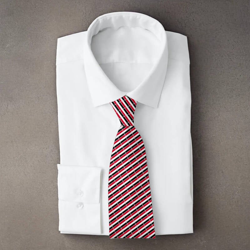 Yemen flag necktie on folded white shirt