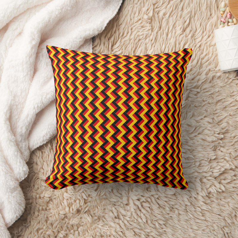Germany flag-inspired pillow in square shape, designed with a creative patchwork motif.