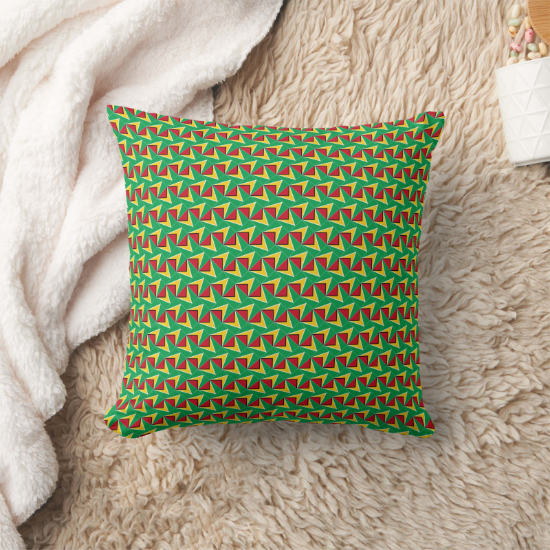 Decorative pillow with a patchwork pattern based on the Guyana national flag.