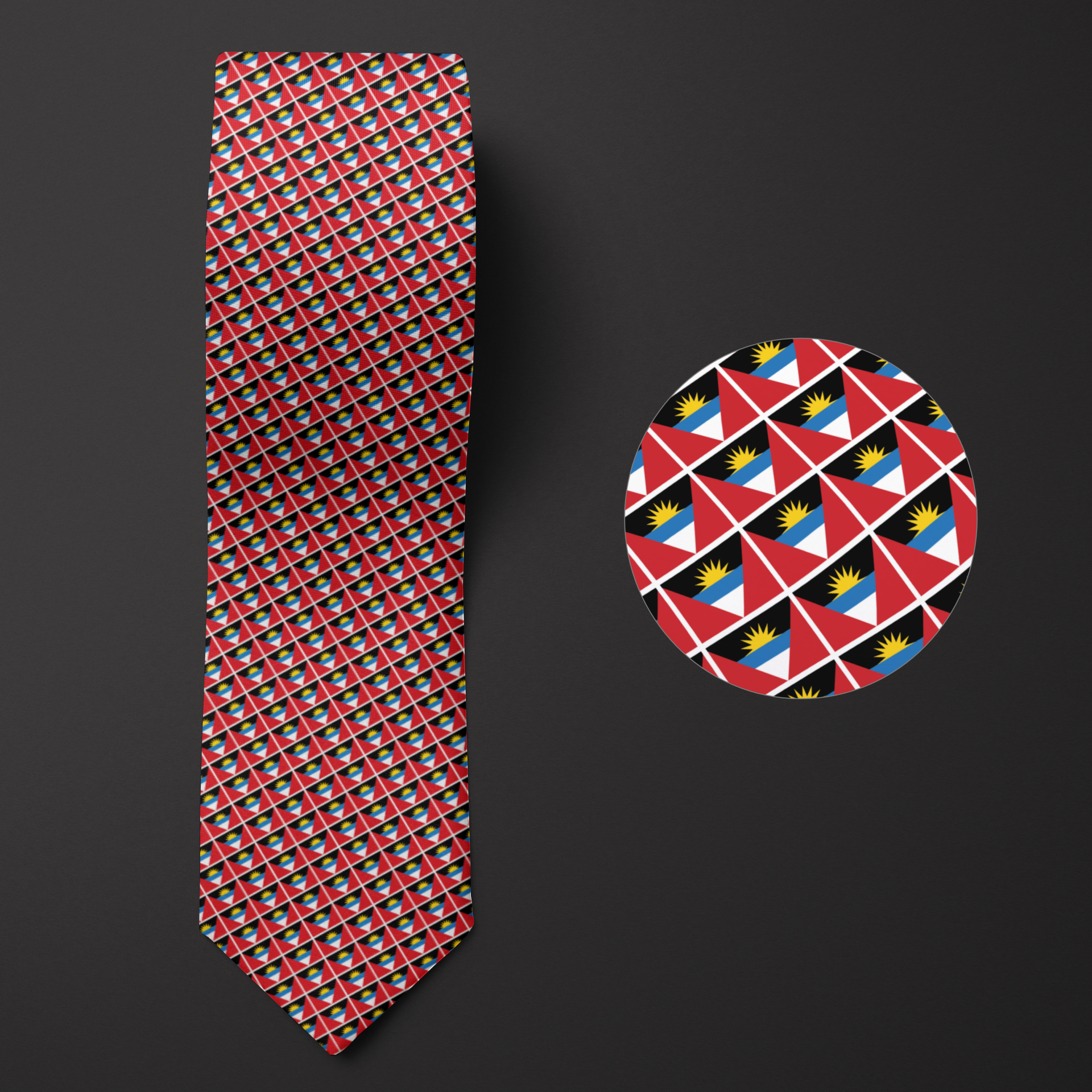Folded men's necktie featuring a pattern inspired by the national flag of Antigua and Barbuda. Includes a magnified view of the design's detail.