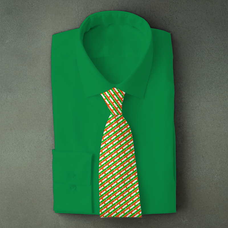 Niger flag necktie on green folded shirt