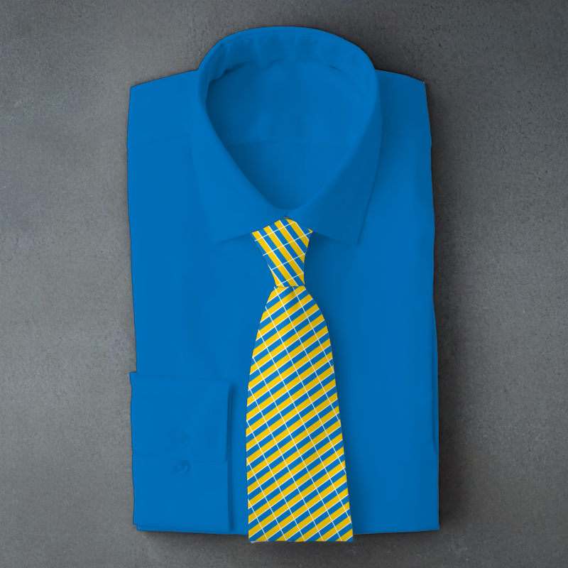 Ukraine flag necktie on blue folded shirt