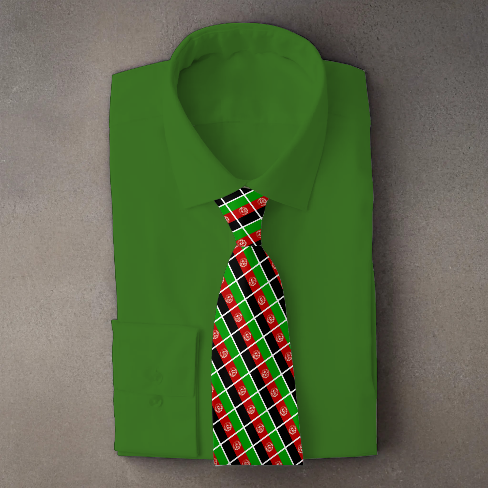 Afghanistan flag necktie on green folded shirt