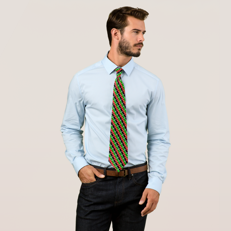 Male model wearing necktie featuring Afghanistan flag pattern.