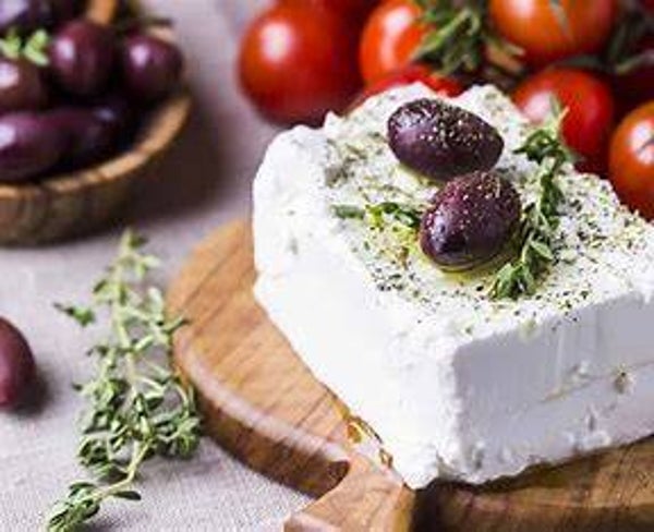 Fetakäse in Scheiben mit Kräutern und Knoblauch 100g