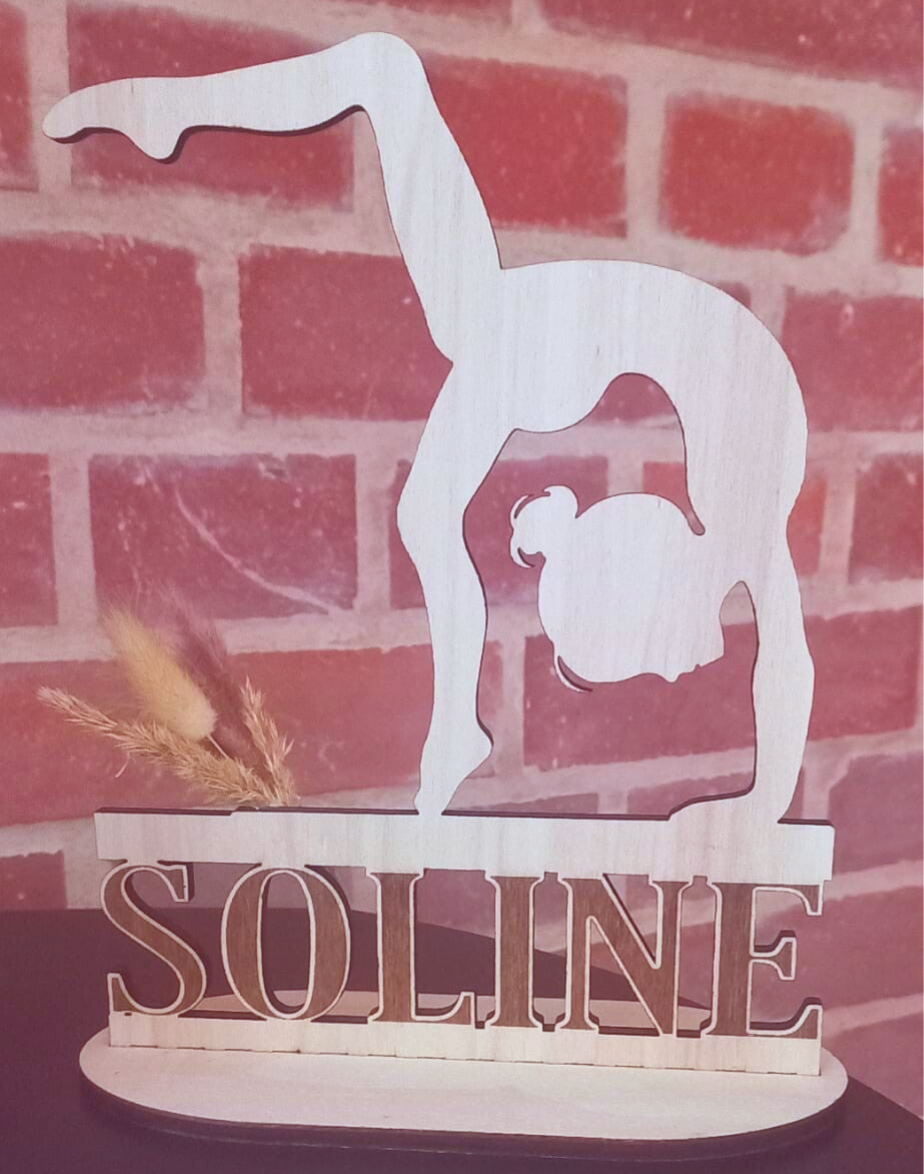 La gymnaste sur la poutre