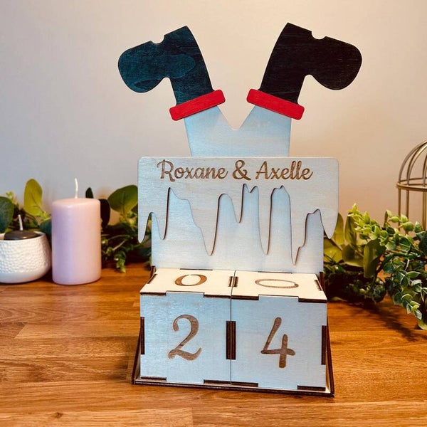 Le calendrier du père noël dans la cheminée