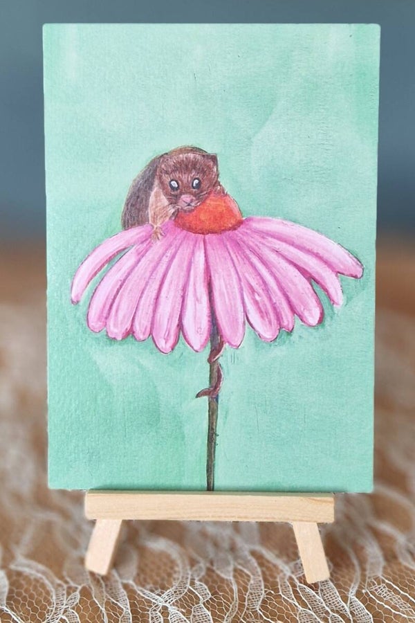 Muisje op bloem