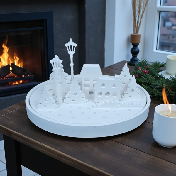 Winterzauber-Dorf mit Teelichtschein