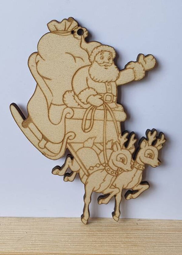 Kerstman met slee