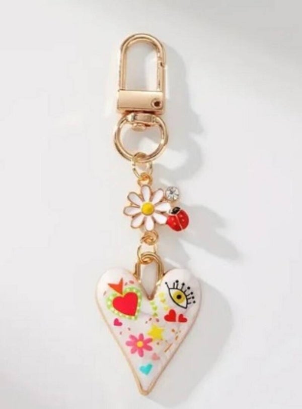 Tashanger Sleutelhanger goud met bewerkt hart