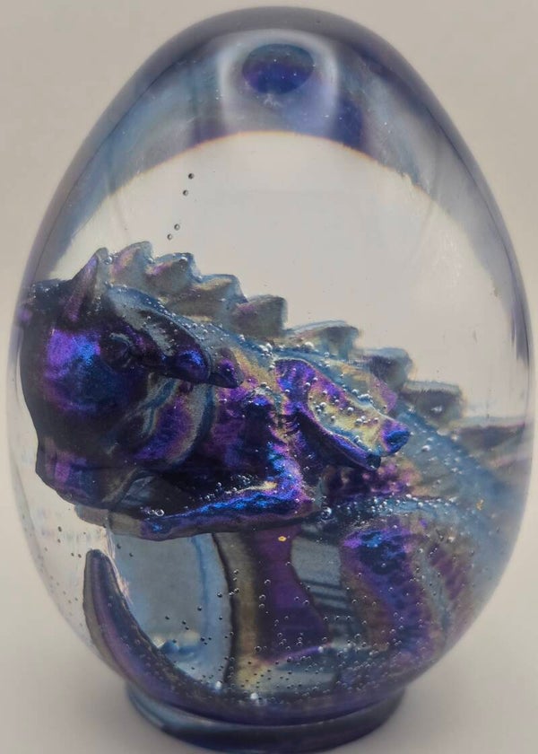Baby Dragon in a clear Egg