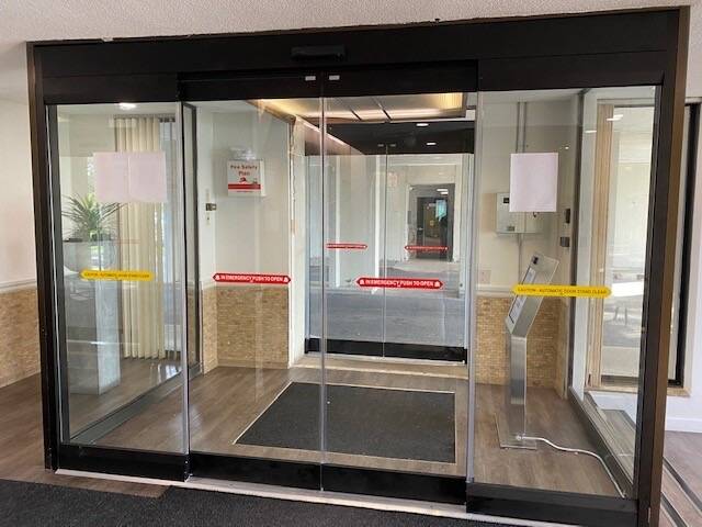 Automatic sliding door system serviced by California Automatic Doors (CAD), providing smooth and reliable entry for commercial and residential properties. Expert installation and repair services for all makes and models of sliding doors, ensuring enhanced