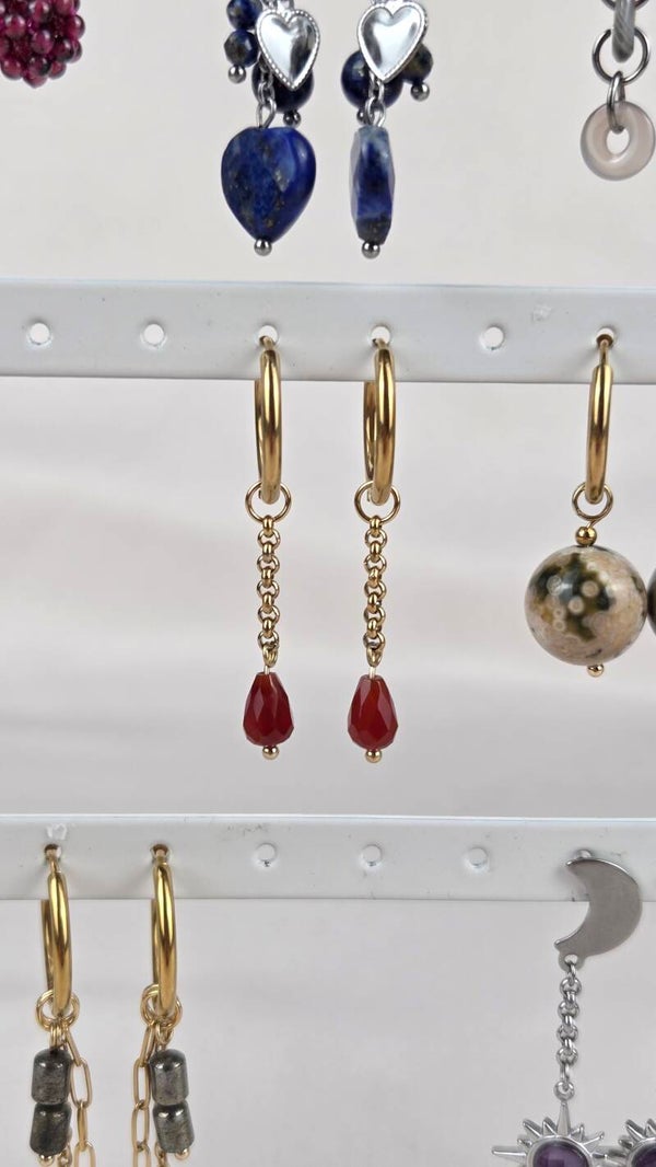 Dangling red teardrop