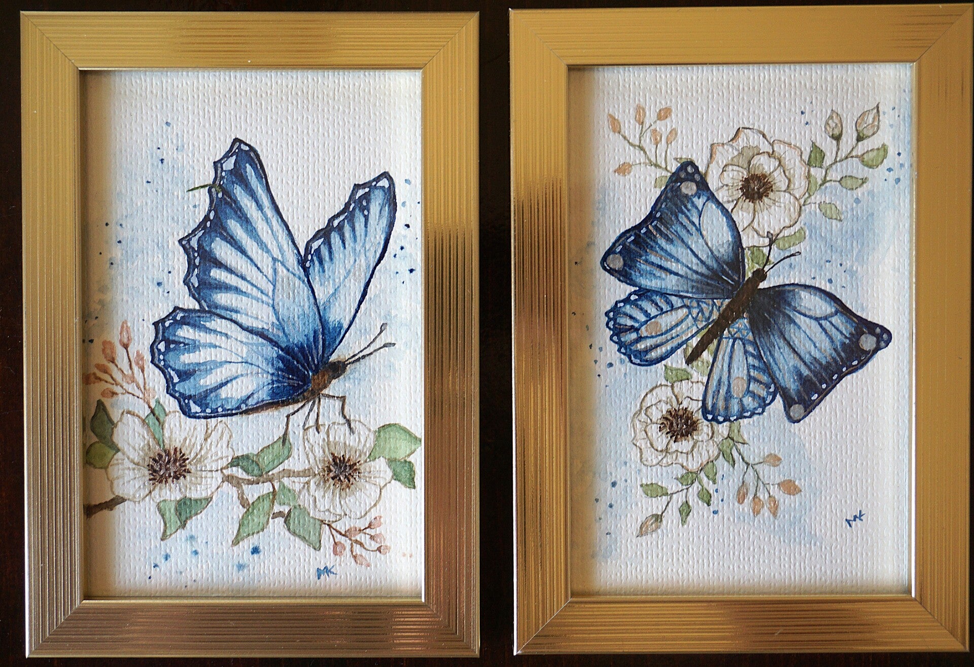 Set vlinders in blauw/goud