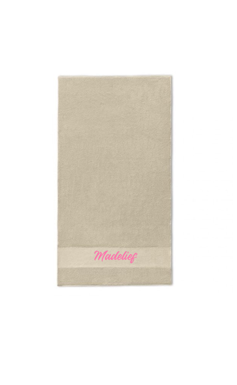 Gepersonaliseerde beige handdoek met geborduurde naam